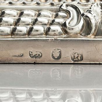 A pair of 18th century silver candlesticks, marks of Ebenezer Coker, London , possibly 1765.