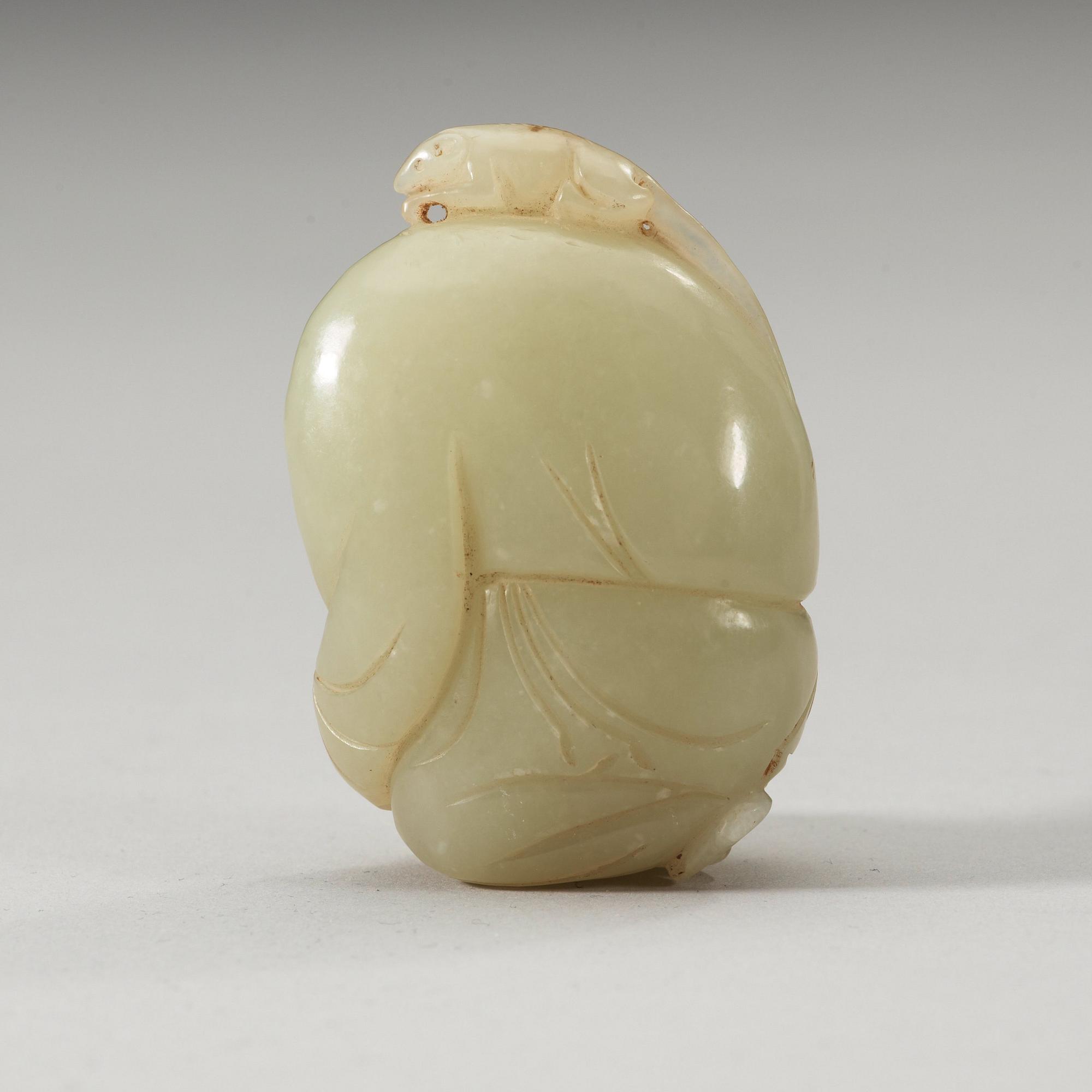 A Chinese nephrite figure of a boy.
