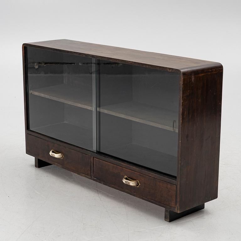 A bookcase, 1930s/1940s.