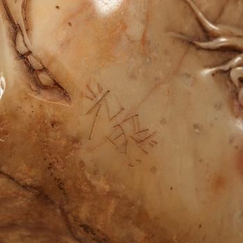 A finely carved Chinese soapstone scholars boulder with inscription.