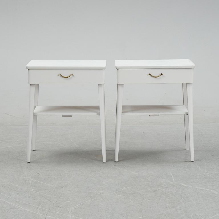 A pair of mid 20th century bedside tables.