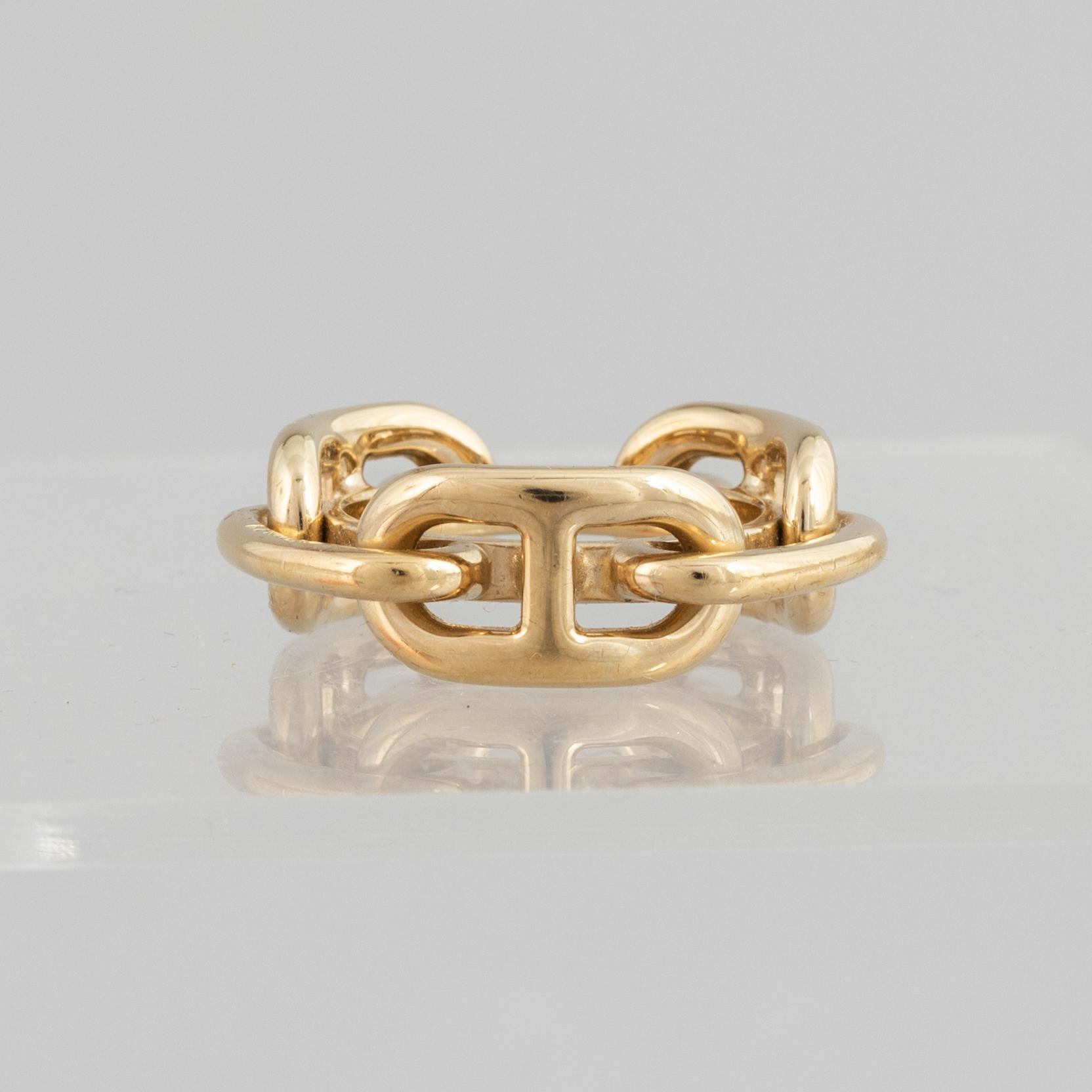 Hermès, a scarf ring.