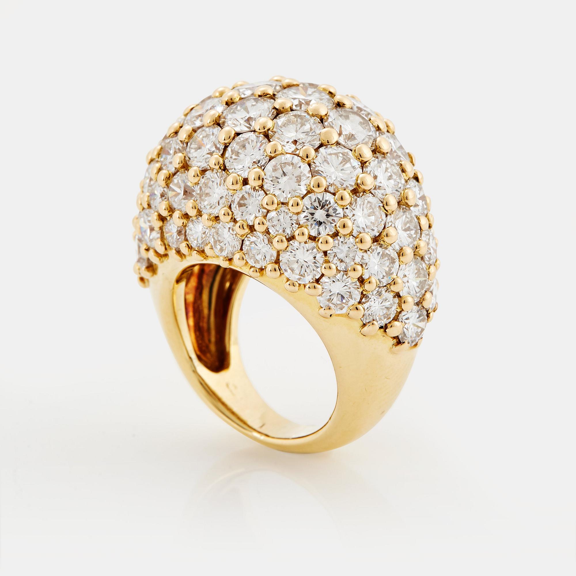 Cartier Marrakech an 18K gold bombe ring set with round brilliant cut diamonds. Bukowskis