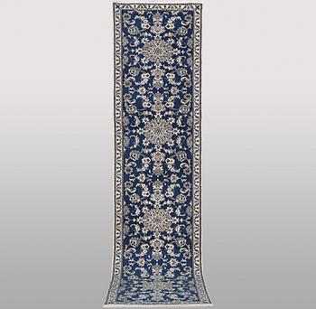 A runner carpet, Nain, part silk, ca 374 x 75 cm.