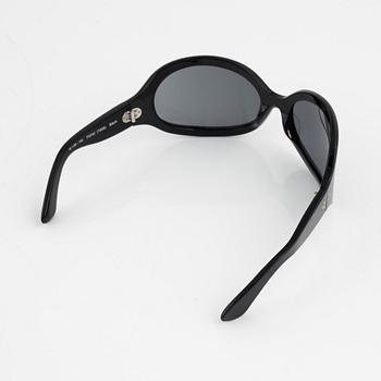 Oliver Goldsmith, a pair of black "Yuhu" sunglasses.