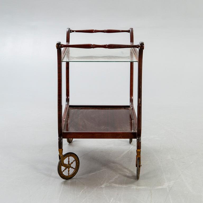 A mid 1900s mahogany serving trolley.