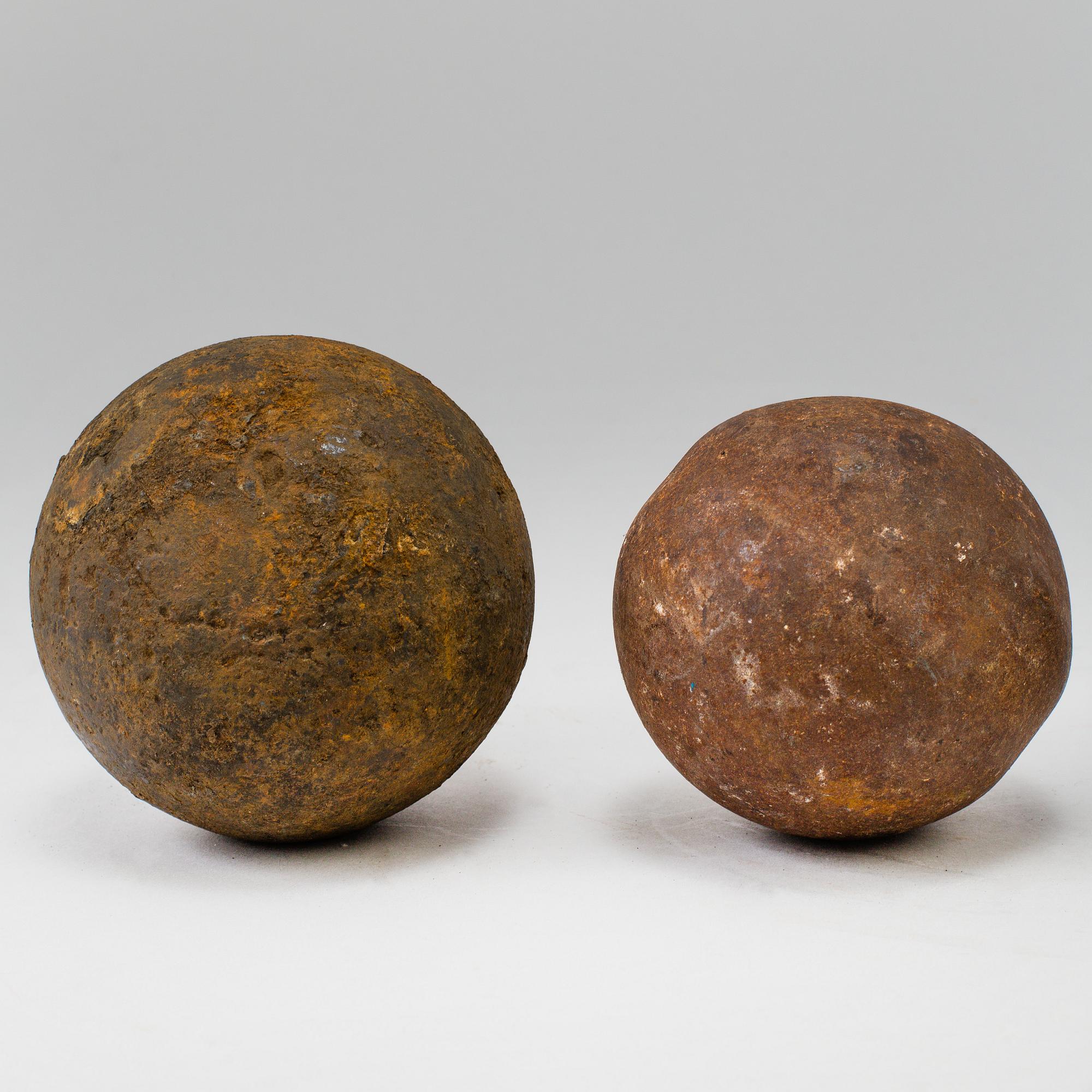 FOUR CAST IRON CANON BALLS, possibly 18th century.