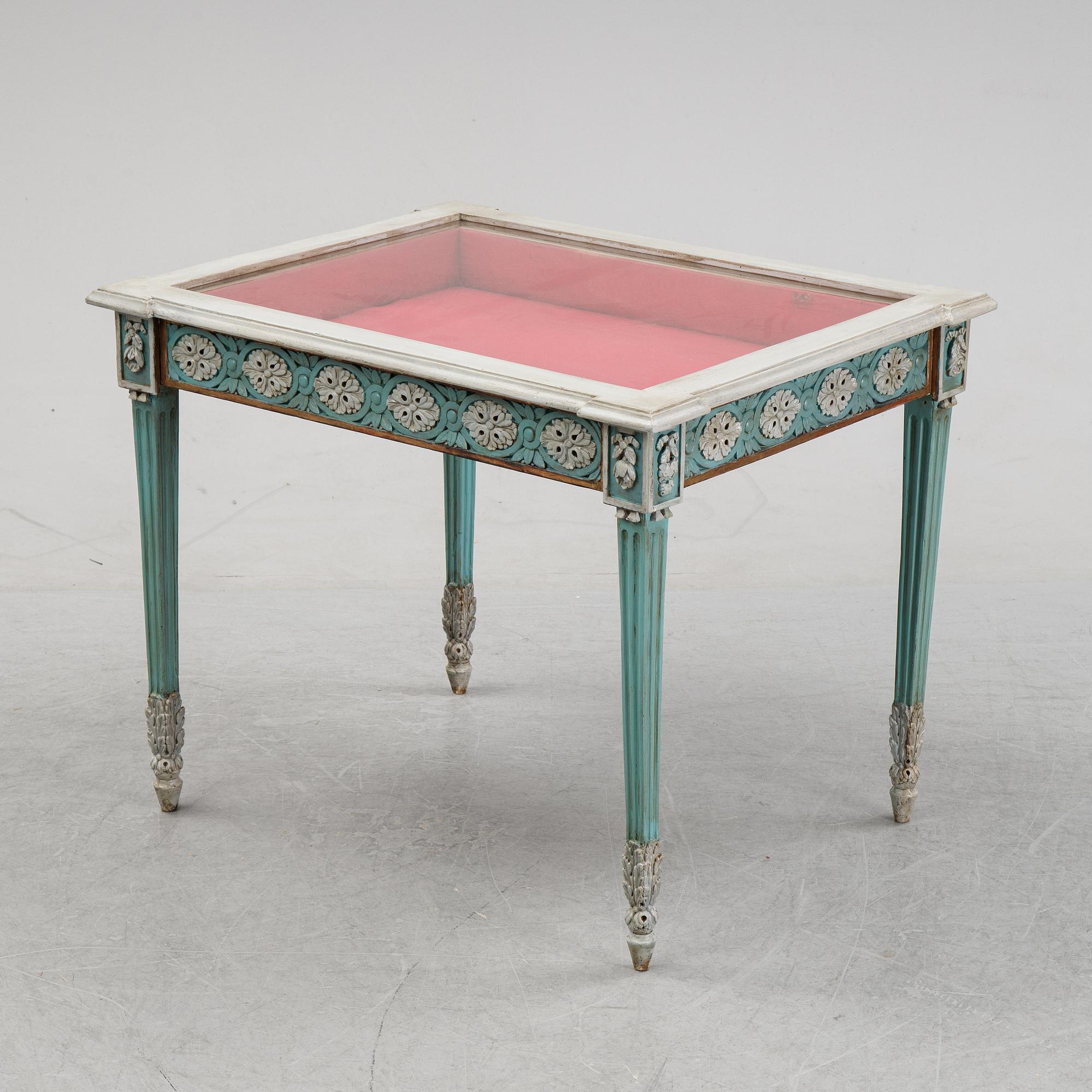 A mid 19th Century display table.