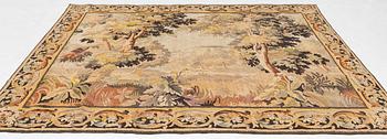 A European 'verdur' tapestry, c. 297 x 290 cm, 17th century.