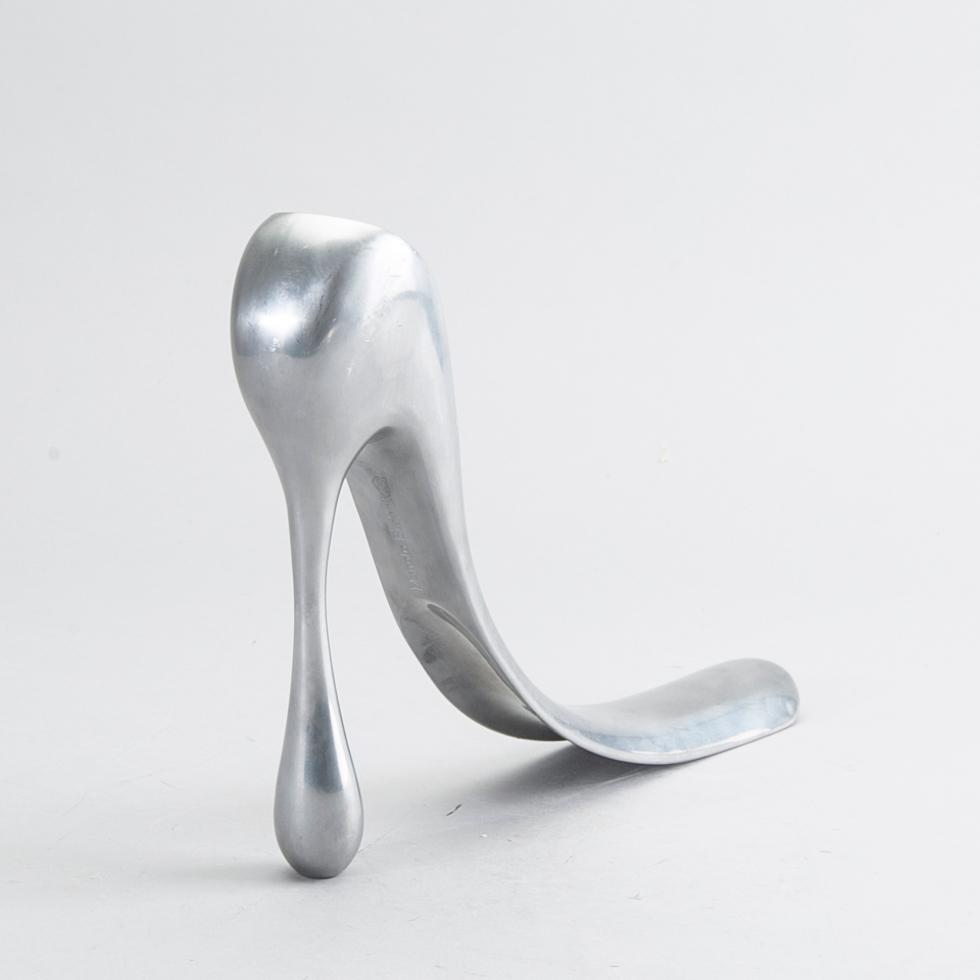 A metal shoe horn by Manolo Blahnik.