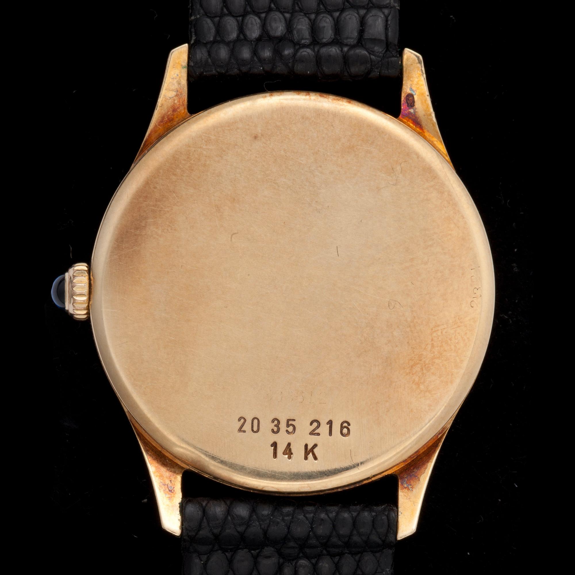 Cartier. Guld. Manuell. Ø 31 mm. ca 1978.