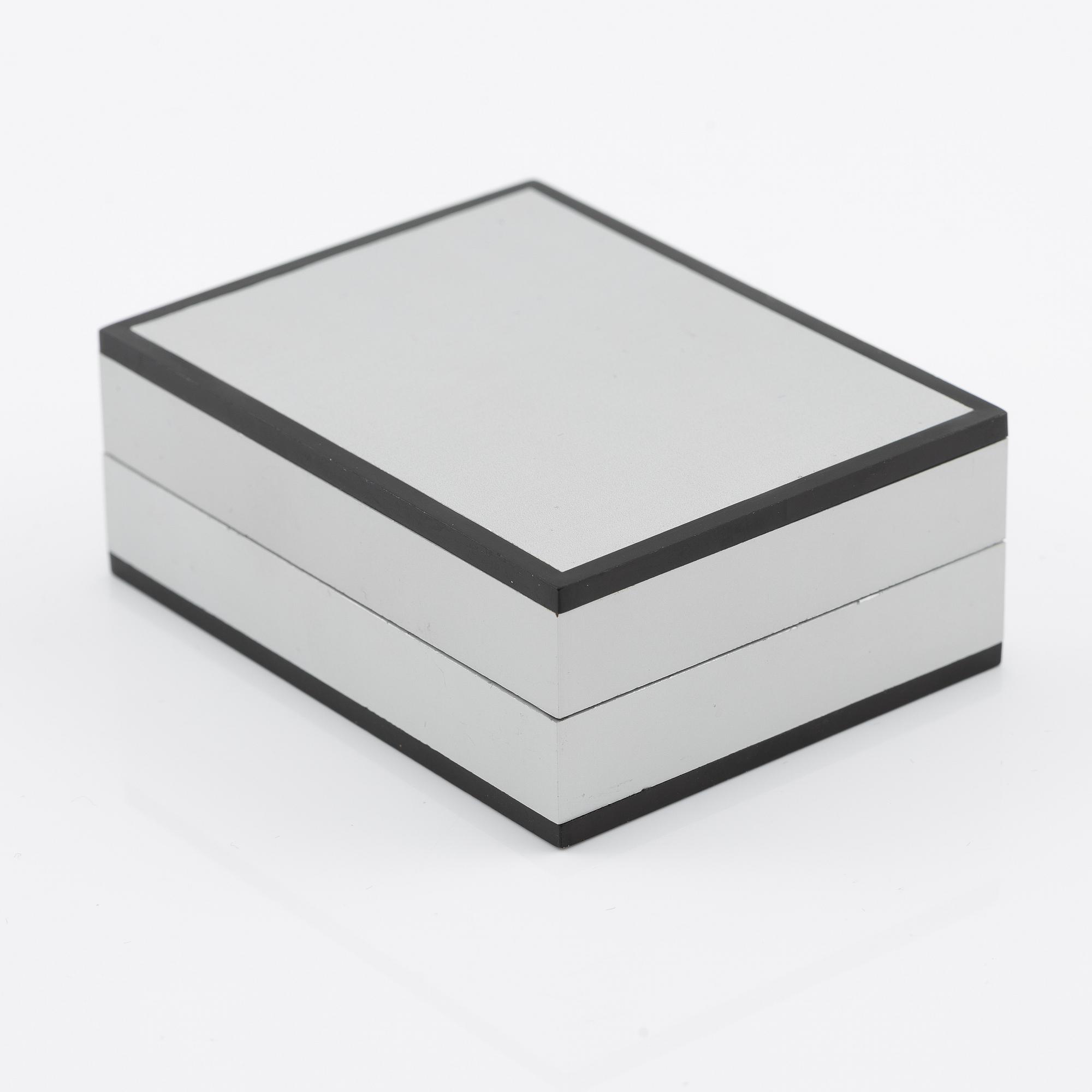 Plaque, 18K gold, numbered 372/1000, 1975, weight approx. 27 g.