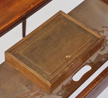 A Gustavian 'concertina action' mahogany games table by Georg Haupt (master in Stockholm 1770-84).