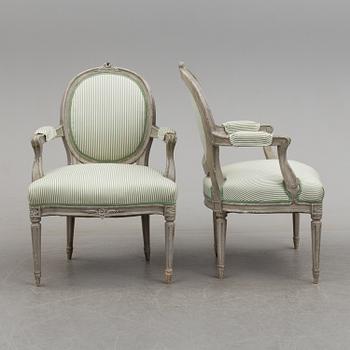 A pair of Gustavian style armchairs, 20th century.