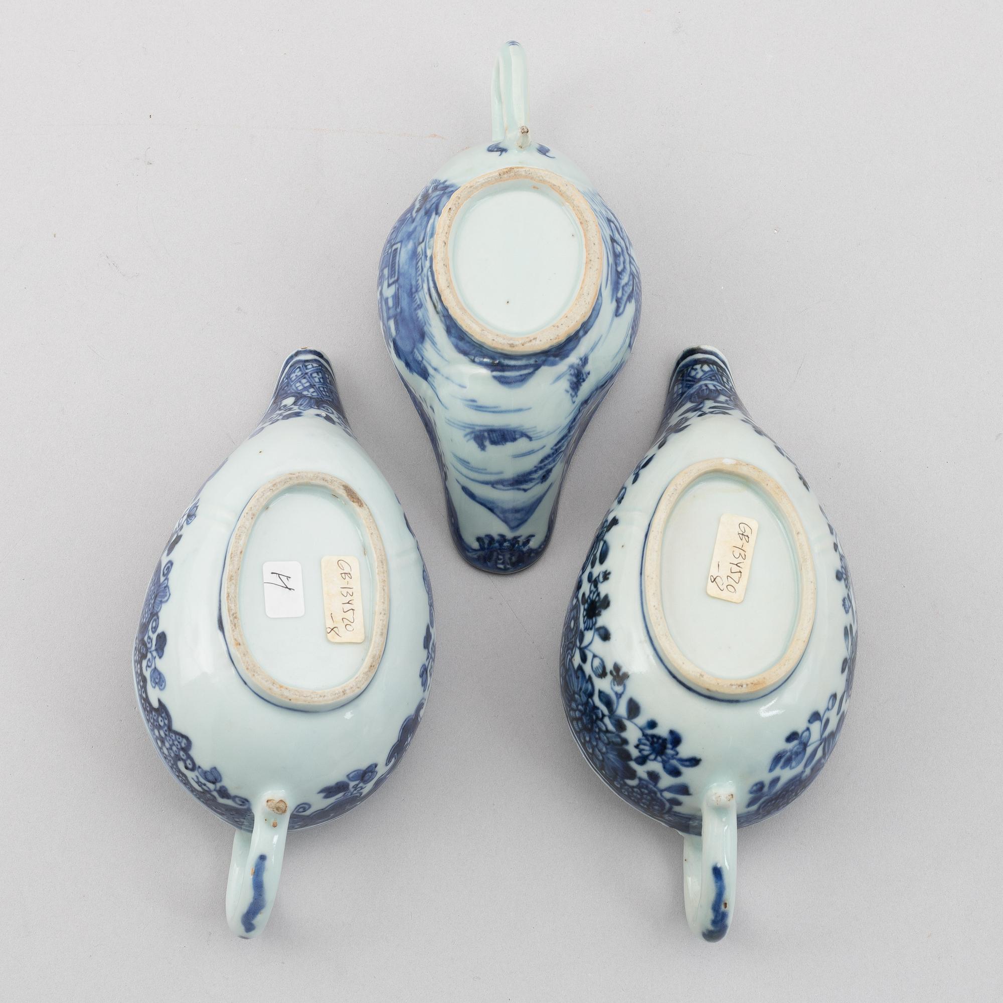 A group of three Chinese blue and white sauce boats, Qing dynsty, Qianlong (1736-95).