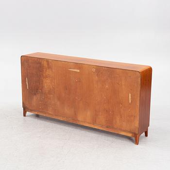 A ahogany-veneered 1940's/50's bookcase.