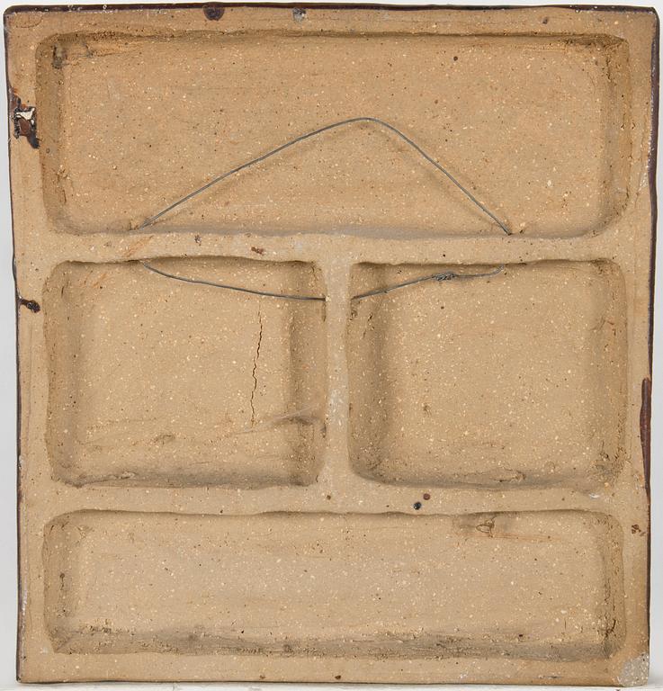 Åke Holm, A stoneware wall relief by Åke Holm, signed.