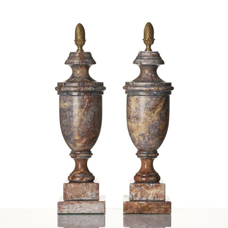 A pair of marble urns, around year 1900.