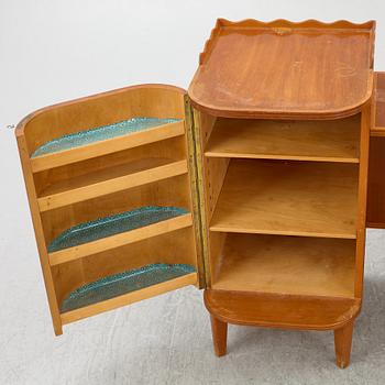 A dressing table with stool and mirror, Stil & Form Arkitektkontor för Möbler o. Inredningar, Stockholm, 1944.