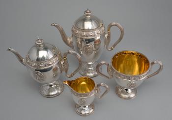 A TEA SERVICE, 4 parts, sterling silver, London 1874 England. Weight 2360 g.