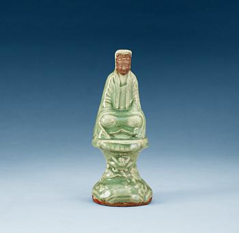 1267. A celadon glazed figure of Guanyin, Ming dynasty.