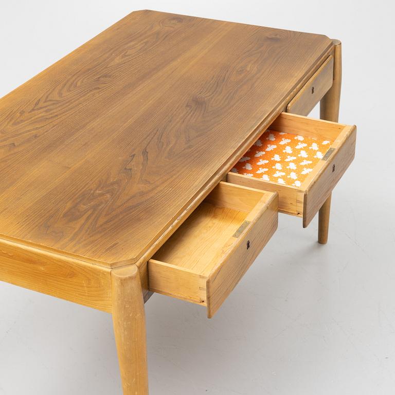 An elm desk, mid 20th Century.