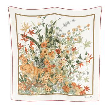 A silk scarf "Renard et fleurs" by Christian Dior.