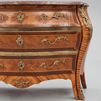 A Swedish Rococo commode, veneered with rosewood and amaranth.