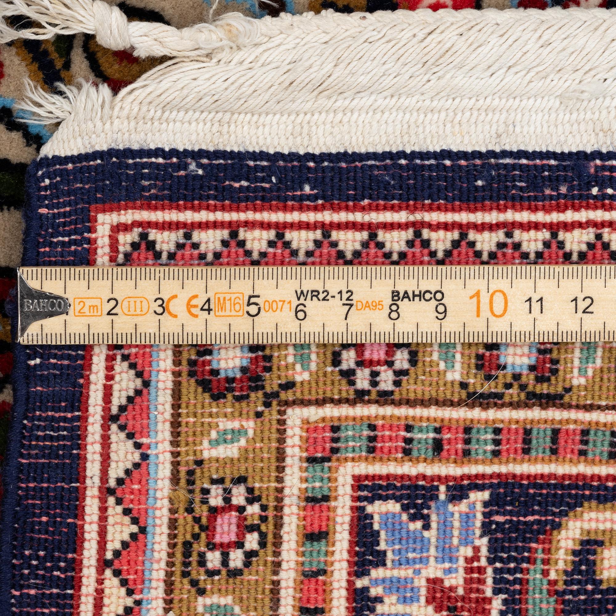 A Gohm rug, probably, c. 220 x 140 cm.