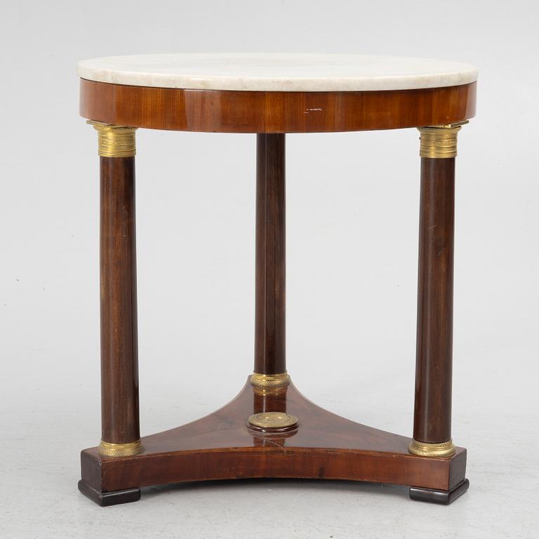A Empire table, 19th Century.