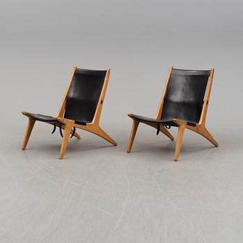 A pair of mid 20th century easy chairs by Östen Kristiansson for Luxus Vittsjö.