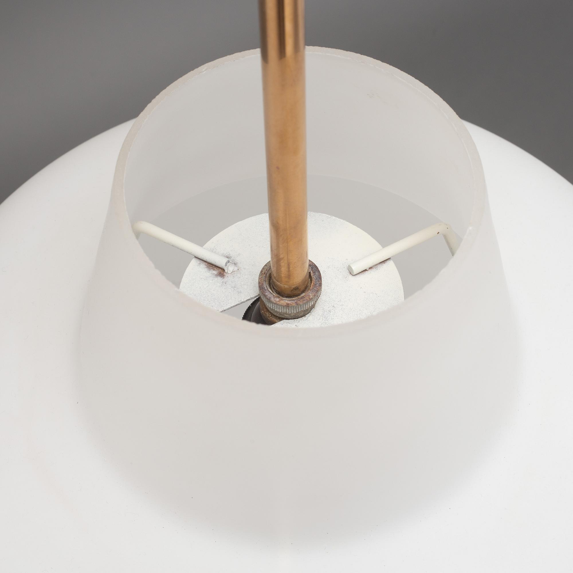 A pair of Swedish Modern ceiling lamps, mid 20th century.