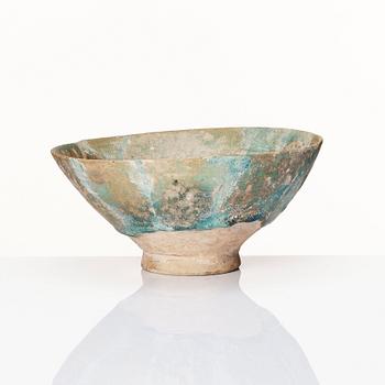 A 10-11th century Kashan Turquoise-glazed pottery bowl.