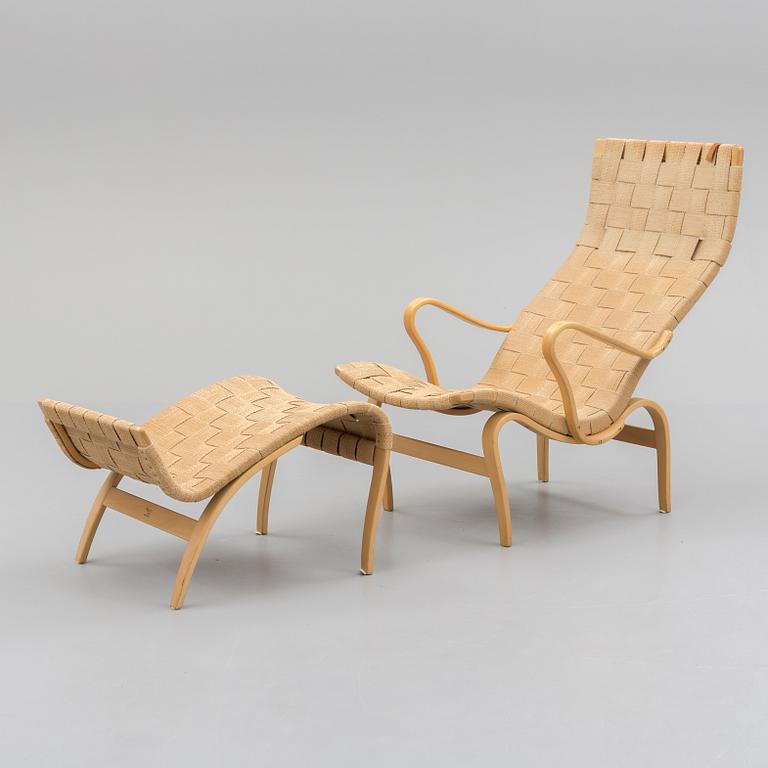 A 'Pernilla' easy chair and foot stool, Bruno Mathsson,  1967.