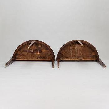 Two half-moon shaped tables from 19th century.