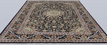 A Kashmar carpet, approx. 335 x 248 cm.
