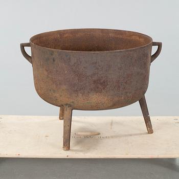 A 19th century iron pot.