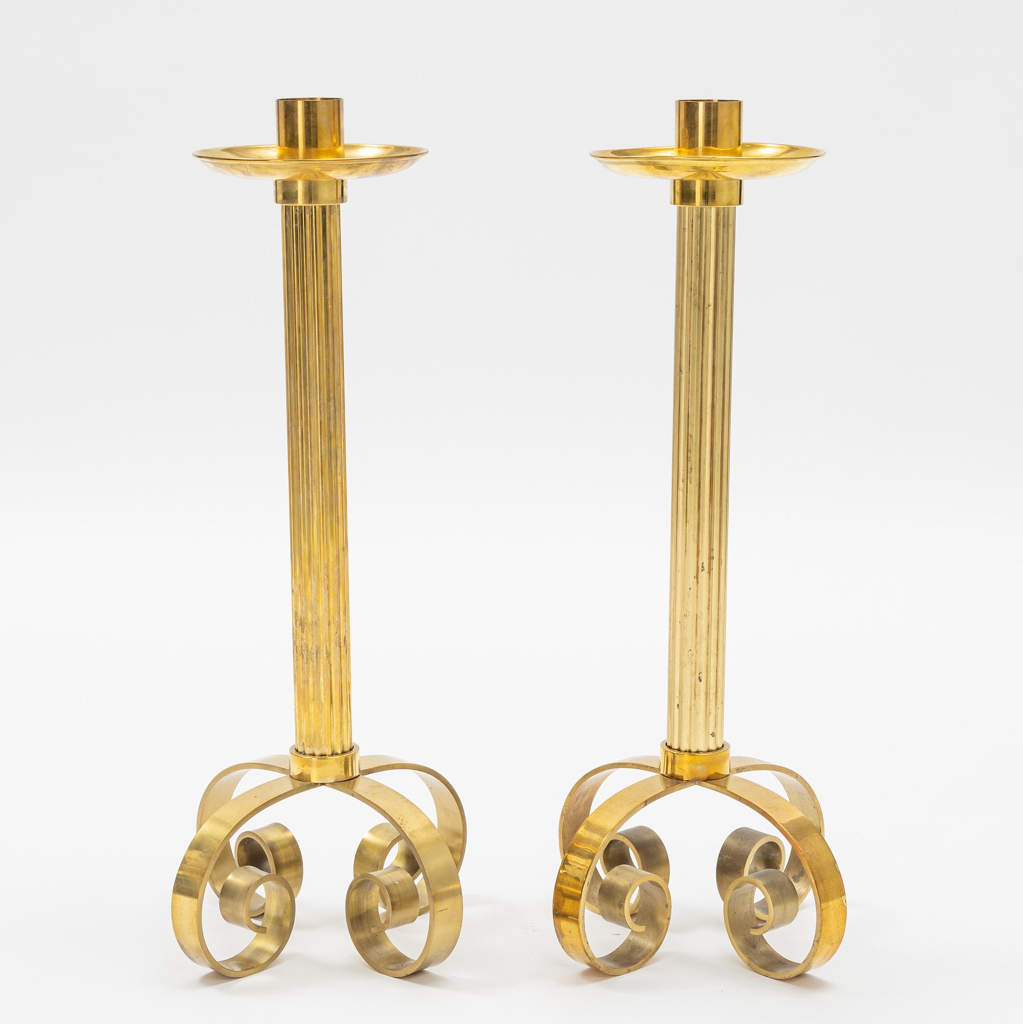 Ivar Ålenius-Björk, a pair of brass candle holders, Ystad Metall.