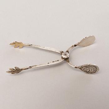 A 3-piece silver coffee set and a silver sugar tong, Finland 1951 and 1946.