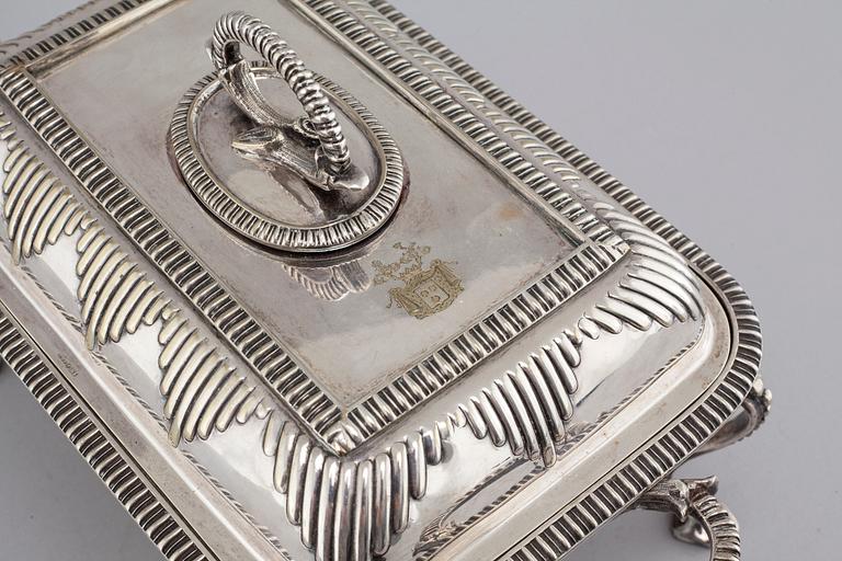 A silvered metal serving dish with rechaud, first half of the 20th century.