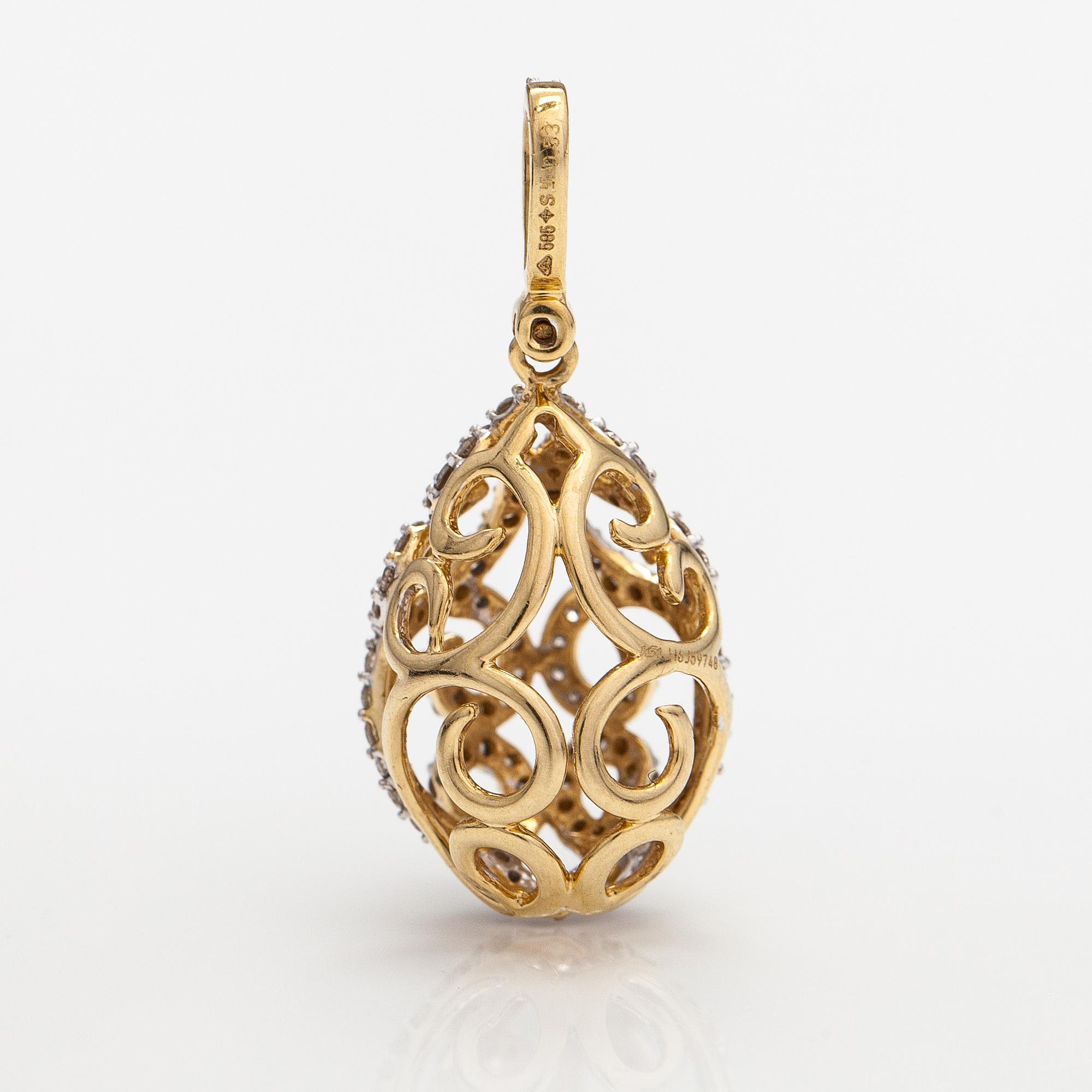 Hänge, 14K guld och diamanter ca 0.53 ct tot. Med IGI certifikatnummer.