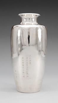 A Japanese silver vase, signed, early 20th Century.
