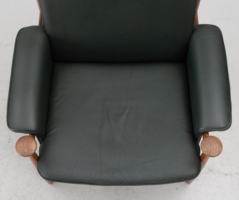 Finn Juhl, a 'Bwana' armchair and ottoman, France & Son, Denmark, 1960's.