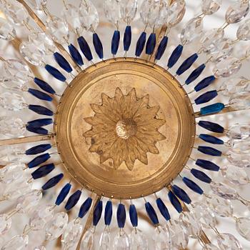 A late Gustavian gilt brass and cut glass thirteen-light chandelier, circa 1800.