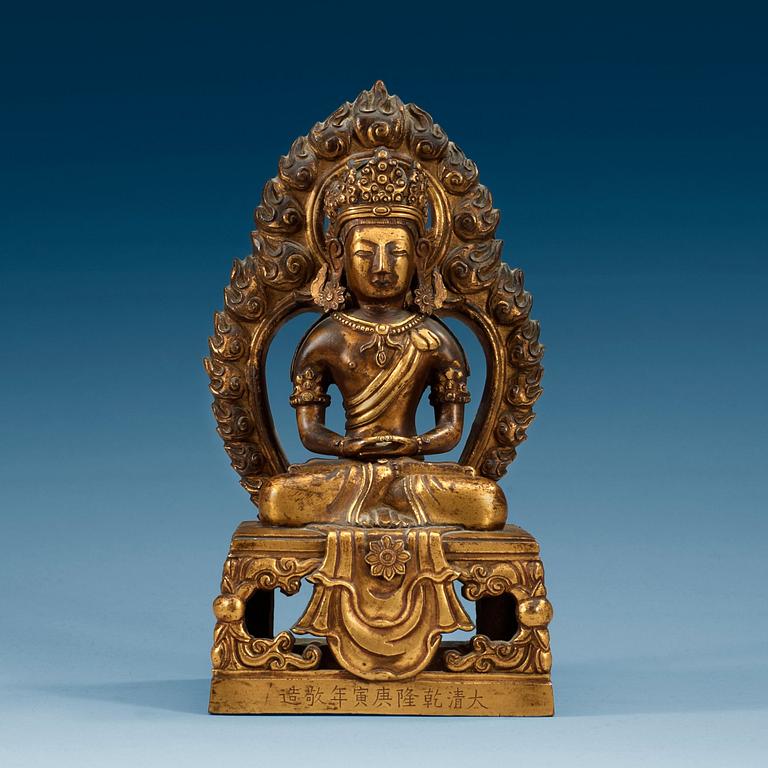 A gilt bronze figure of a Bodhisattva, Qing dynasty with Qianlong mark and period, dated 1770.