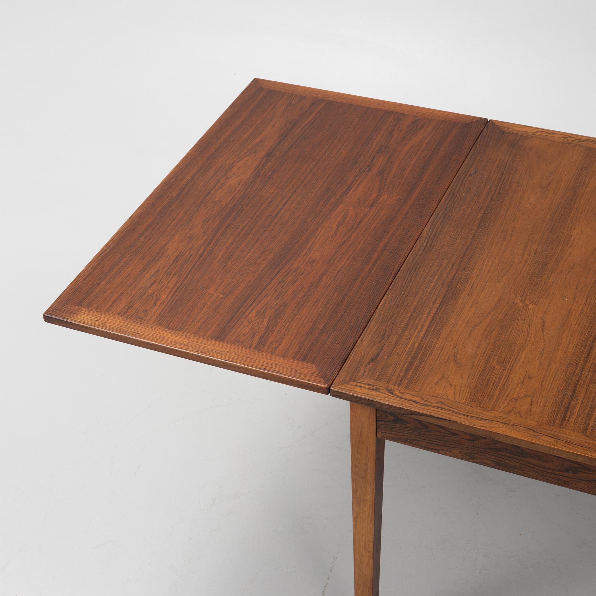 A Danish Dining Table and Six Chairs, 1960s.