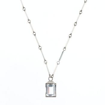805. A Wiwen Nilsson rock crystal pendant and chain, Lund 1937.