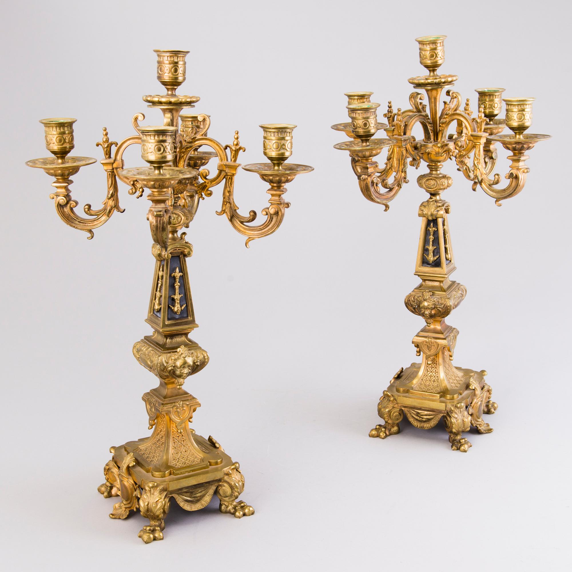 A pair of bronze candelabra from the latter half of the 19th Century.