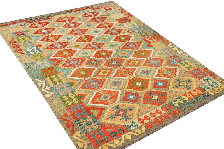 An Afghan Kilim carpet, c. 305 x 200 cm.