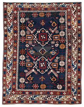 460. A RUG. A semi-antique Kuba/Shirvan. 165,5 x 129,5 cm (as well as one end with one cm flat weave).